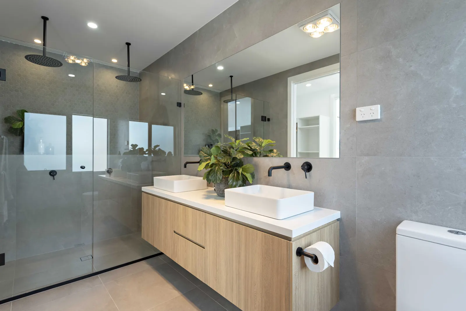 Ensuite with double vanity, twin rain showers and black tapware