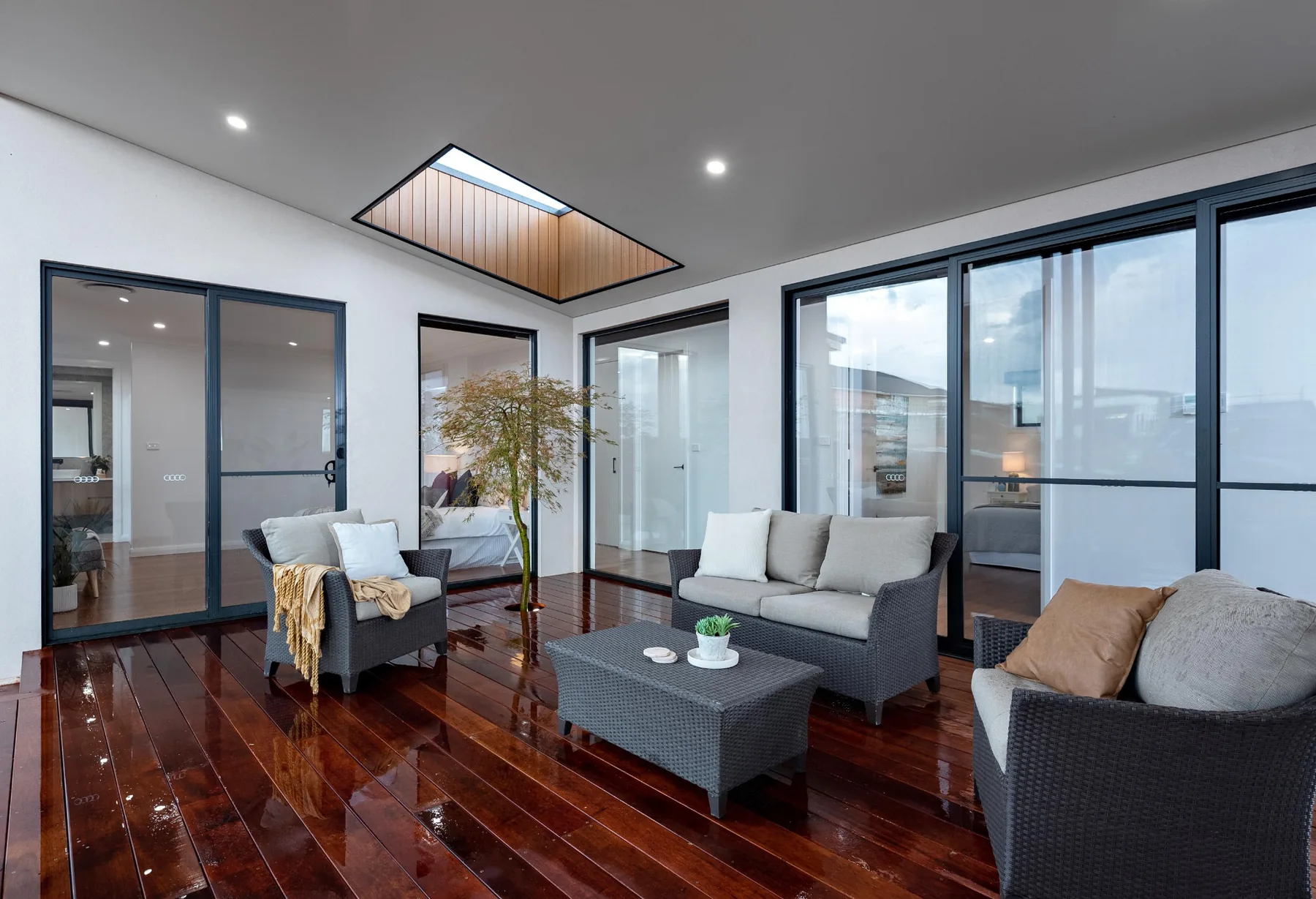 Internal courtyard with timber lined skylight and merbau decking