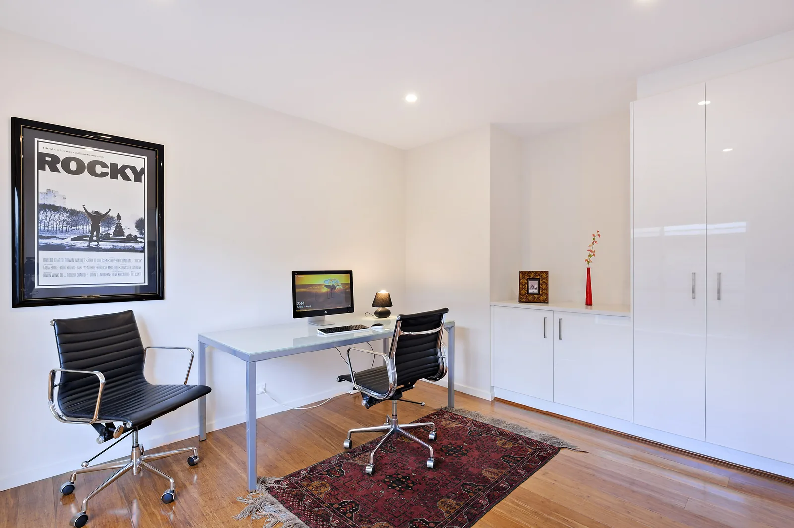 Home office with built in storage and desk space for two