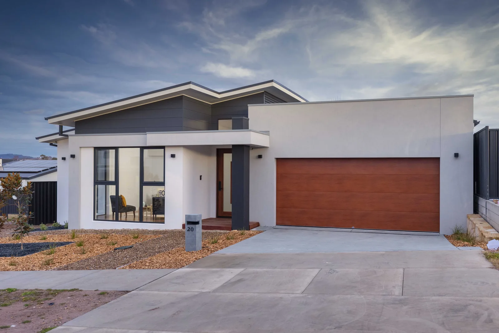 Completed single level home with skillion rooflines and cedar look garage door, Canberra ACT