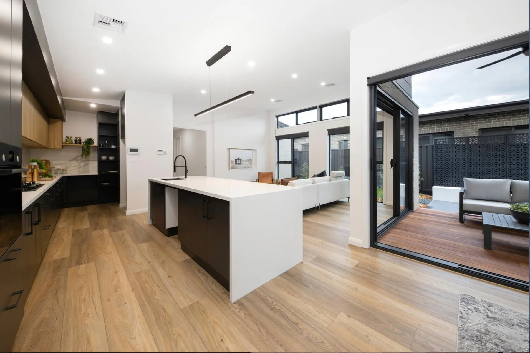 Kitchen, living and alfresco connection, contemporary family home in Canberra